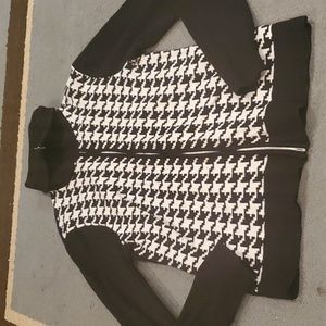 Woman's E.P. Pro size Medium zipe up sweater black and white